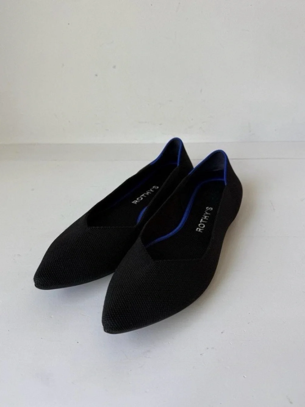 Rothy's Black Pointed Knit Flats with Blue Trim